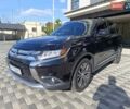Черный Мицубиси Аутлендер, объемом двигателя 2.36 л и пробегом 120 тыс. км за 16900 $, фото 1 на Automoto.ua
