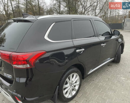 Чорний Міцубісі Аутлендер, об'ємом двигуна 2 л та пробігом 145 тис. км за 21200 $, фото 14 на Automoto.ua