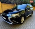 Черный Мицубиси Аутлендер, объемом двигателя 2.36 л и пробегом 130 тыс. км за 13500 $, фото 2 на Automoto.ua