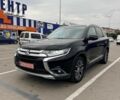 Чорний Міцубісі Аутлендер, об'ємом двигуна 2.3 л та пробігом 184 тис. км за 16790 $, фото 1 на Automoto.ua