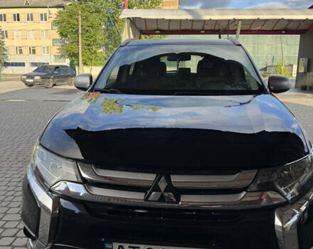 Чорний Міцубісі Аутлендер, об'ємом двигуна 2.36 л та пробігом 194 тис. км за 14800 $, фото 1 на Automoto.ua