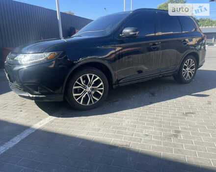 Черный Мицубиси Аутлендер, объемом двигателя 2.36 л и пробегом 190 тыс. км за 13500 $, фото 4 на Automoto.ua