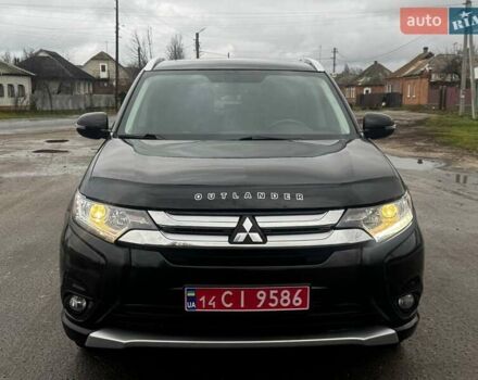 Черный Мицубиси Аутлендер, объемом двигателя 3 л и пробегом 99 тыс. км за 15980 $, фото 1 на Automoto.ua