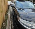 Чорний Міцубісі Аутлендер, об'ємом двигуна 2.4 л та пробігом 195 тис. км за 15138 $, фото 1 на Automoto.ua