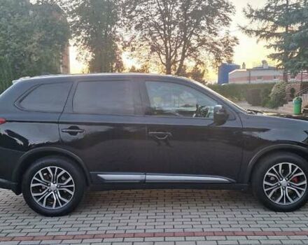 Черный Мицубиси Аутлендер, объемом двигателя 2.36 л и пробегом 168 тыс. км за 14999 $, фото 8 на Automoto.ua