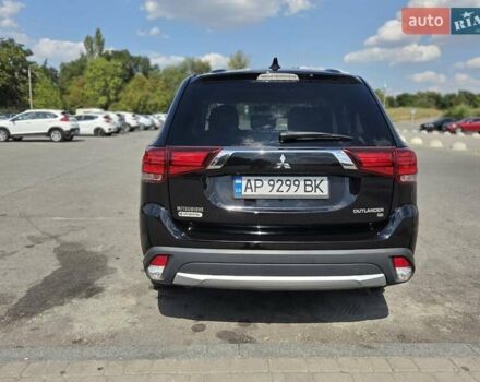 Чорний Міцубісі Аутлендер, об'ємом двигуна 2.36 л та пробігом 119 тис. км за 15500 $, фото 6 на Automoto.ua