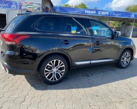 Чорний Міцубісі Аутлендер, об'ємом двигуна 2.4 л та пробігом 120 тис. км за 16000 $, фото 1 на Automoto.ua