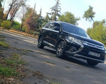 Черный Мицубиси Аутлендер, объемом двигателя 2.4 л и пробегом 156 тыс. км за 330 $, фото 4 на Automoto.ua