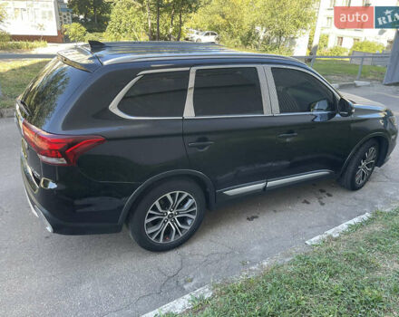 Чорний Міцубісі Аутлендер, об'ємом двигуна 2.36 л та пробігом 150 тис. км за 13500 $, фото 4 на Automoto.ua