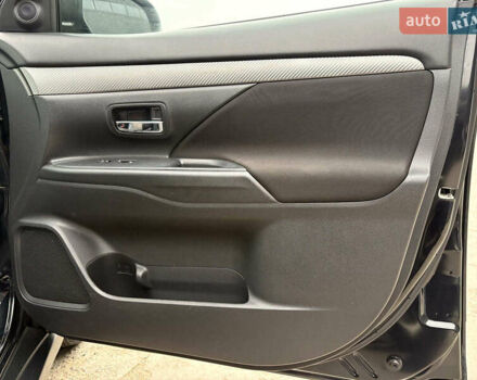 Чорний Міцубісі Аутлендер, об'ємом двигуна 2.4 л та пробігом 110 тис. км за 17290 $, фото 28 на Automoto.ua