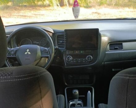 Черный Мицубиси Аутлендер, объемом двигателя 2.4 л и пробегом 156 тыс. км за 330 $, фото 17 на Automoto.ua