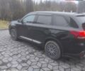 Чорний Міцубісі Аутлендер, об'ємом двигуна 2 л та пробігом 63 тис. км за 17500 $, фото 1 на Automoto.ua