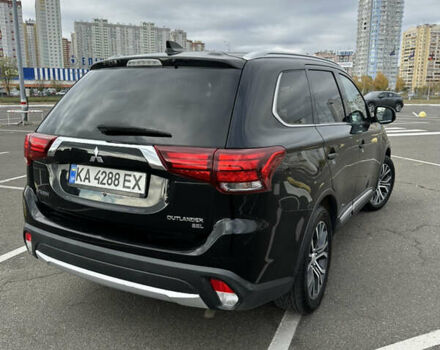 Чорний Міцубісі Аутлендер, об'ємом двигуна 2.36 л та пробігом 166 тис. км за 17100 $, фото 3 на Automoto.ua