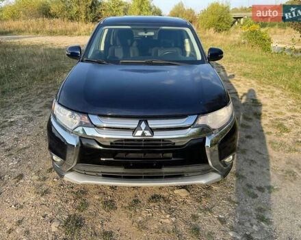 Черный Мицубиси Аутлендер, объемом двигателя 2.4 л и пробегом 221 тыс. км за 11900 $, фото 9 на Automoto.ua
