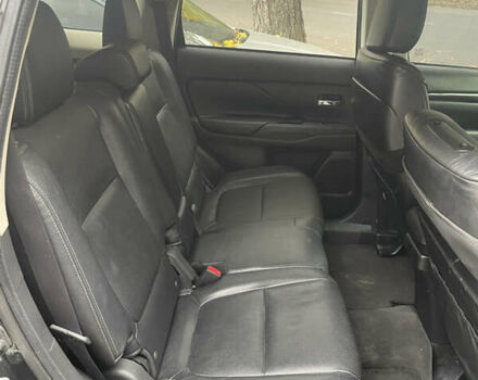 Чорний Міцубісі Аутлендер, об'ємом двигуна 2.36 л та пробігом 150 тис. км за 13500 $, фото 10 на Automoto.ua