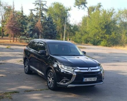 Черный Мицубиси Аутлендер, объемом двигателя 2.4 л и пробегом 156 тыс. км за 330 $, фото 2 на Automoto.ua