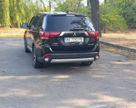 Черный Мицубиси Аутлендер, объемом двигателя 2.4 л и пробегом 156 тыс. км за 330 $, фото 9 на Automoto.ua