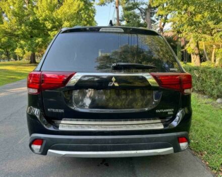 Черный Мицубиси Аутлендер, объемом двигателя 2.4 л и пробегом 66 тыс. км за 10650 $, фото 5 на Automoto.ua