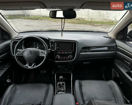 Черный Мицубиси Аутлендер, объемом двигателя 2.36 л и пробегом 128 тыс. км за 15500 $, фото 13 на Automoto.ua