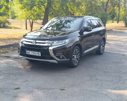 Черный Мицубиси Аутлендер, объемом двигателя 2.4 л и пробегом 156 тыс. км за 330 $, фото 1 на Automoto.ua