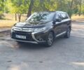Черный Мицубиси Аутлендер, объемом двигателя 2.4 л и пробегом 156 тыс. км за 330 $, фото 1 на Automoto.ua