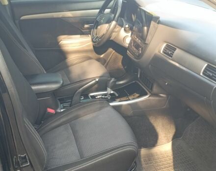 Черный Мицубиси Аутлендер, объемом двигателя 2.4 л и пробегом 156 тыс. км за 330 $, фото 11 на Automoto.ua