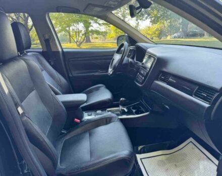 Черный Мицубиси Аутлендер, объемом двигателя 2.4 л и пробегом 66 тыс. км за 10650 $, фото 7 на Automoto.ua