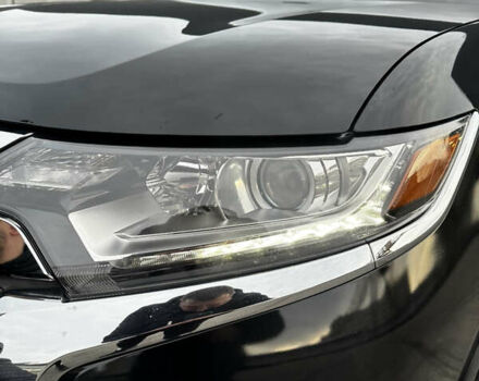 Черный Мицубиси Аутлендер, объемом двигателя 2.36 л и пробегом 128 тыс. км за 15500 $, фото 2 на Automoto.ua