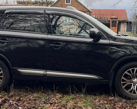 Чорний Міцубісі Аутлендер, об'ємом двигуна 2.36 л та пробігом 110 тис. км за 17500 $, фото 3 на Automoto.ua