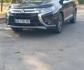 Черный Мицубиси Аутлендер, объемом двигателя 2.4 л и пробегом 156 тыс. км за 330 $, фото 6 на Automoto.ua