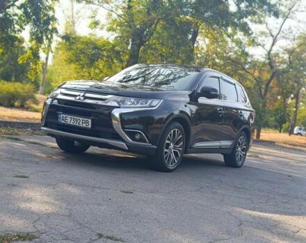 Черный Мицубиси Аутлендер, объемом двигателя 2.4 л и пробегом 156 тыс. км за 330 $, фото 7 на Automoto.ua