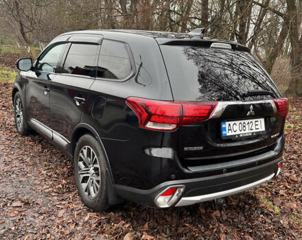 Чорний Міцубісі Аутлендер, об'ємом двигуна 2.36 л та пробігом 110 тис. км за 17500 $, фото 5 на Automoto.ua