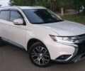 Черный Мицубиси Аутлендер, объемом двигателя 2.36 л и пробегом 125 тыс. км за 17499 $, фото 1 на Automoto.ua
