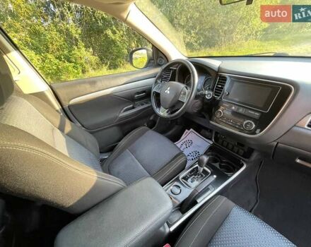 Черный Мицубиси Аутлендер, объемом двигателя 2.4 л и пробегом 221 тыс. км за 11900 $, фото 15 на Automoto.ua