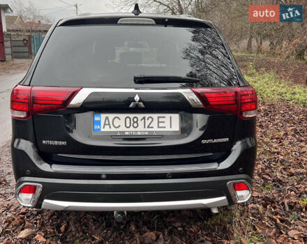 Чорний Міцубісі Аутлендер, об'ємом двигуна 2.36 л та пробігом 110 тис. км за 17500 $, фото 4 на Automoto.ua