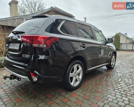 Черный Мицубиси Аутлендер, объемом двигателя 2 л и пробегом 98 тыс. км за 18350 $, фото 14 на Automoto.ua