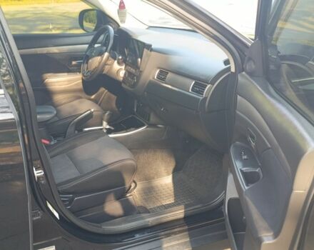 Черный Мицубиси Аутлендер, объемом двигателя 2.4 л и пробегом 156 тыс. км за 330 $, фото 12 на Automoto.ua