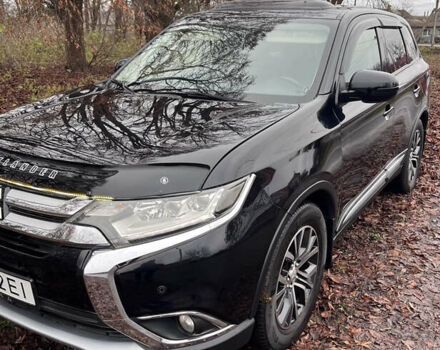 Чорний Міцубісі Аутлендер, об'ємом двигуна 2.36 л та пробігом 110 тис. км за 17500 $, фото 6 на Automoto.ua