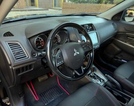 Черный Мицубиси Аутлендер, объемом двигателя 2.4 л и пробегом 130 тыс. км за 13900 $, фото 11 на Automoto.ua