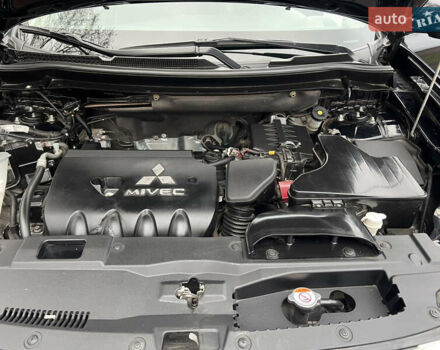 Чорний Міцубісі Аутлендер, об'ємом двигуна 2.36 л та пробігом 110 тис. км за 17500 $, фото 17 на Automoto.ua