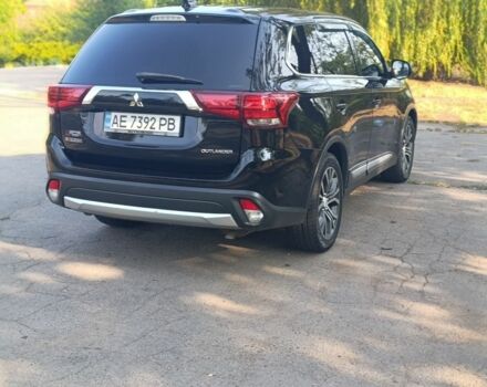 Черный Мицубиси Аутлендер, объемом двигателя 2.4 л и пробегом 156 тыс. км за 330 $, фото 10 на Automoto.ua