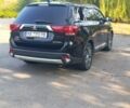 Черный Мицубиси Аутлендер, объемом двигателя 2.4 л и пробегом 156 тыс. км за 330 $, фото 10 на Automoto.ua