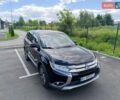 Черный Мицубиси Аутлендер, объемом двигателя 2.36 л и пробегом 98 тыс. км за 15600 $, фото 4 на Automoto.ua