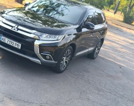 Черный Мицубиси Аутлендер, объемом двигателя 2.4 л и пробегом 156 тыс. км за 330 $, фото 5 на Automoto.ua