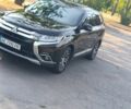 Черный Мицубиси Аутлендер, объемом двигателя 2.4 л и пробегом 156 тыс. км за 330 $, фото 5 на Automoto.ua