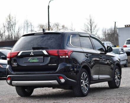 Чорний Міцубісі Аутлендер, об'ємом двигуна 2.4 л та пробігом 154 тис. км за 13499 $, фото 1 на Automoto.ua