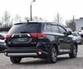 Чорний Міцубісі Аутлендер, об'ємом двигуна 2.4 л та пробігом 154 тис. км за 13499 $, фото 1 на Automoto.ua