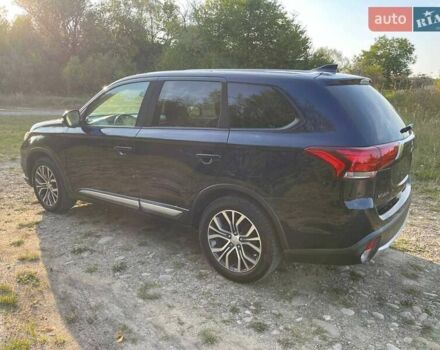 Черный Мицубиси Аутлендер, объемом двигателя 2.4 л и пробегом 221 тыс. км за 11900 $, фото 6 на Automoto.ua