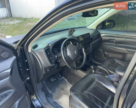 Чорний Міцубісі Аутлендер, об'ємом двигуна 2.36 л та пробігом 150 тис. км за 13500 $, фото 6 на Automoto.ua