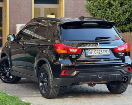 Черный Мицубиси Аутлендер, объемом двигателя 2.4 л и пробегом 130 тыс. км за 13900 $, фото 5 на Automoto.ua